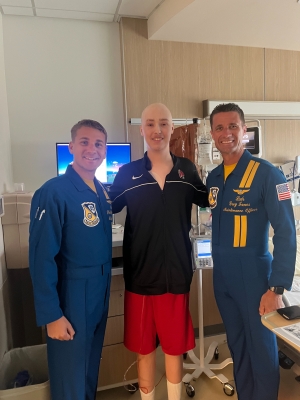 Bradon with two Blue Angels in hospital room