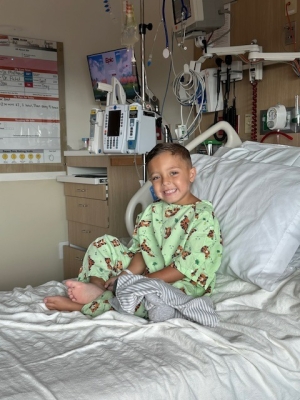 Landon in hospital bed during inpatient stay