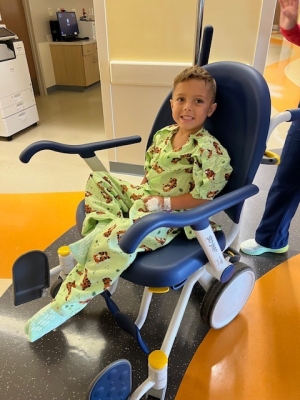 Landon in wheelchair during inpatient stay