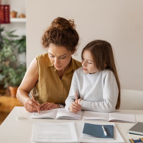 Parent writing in journal