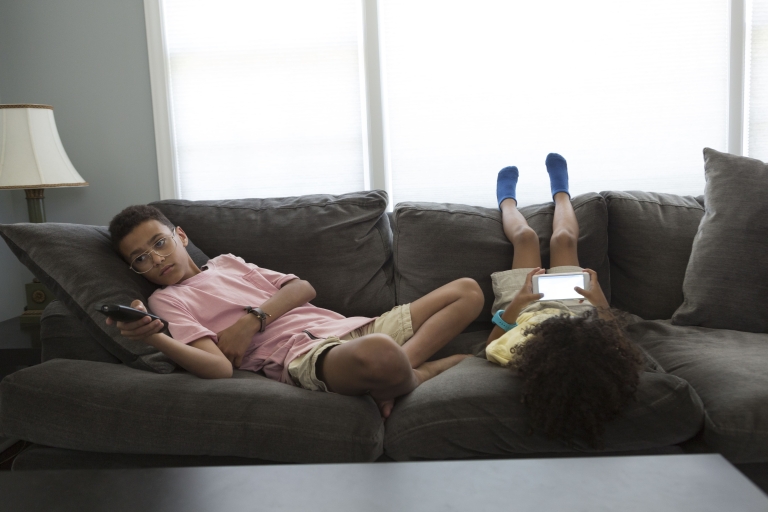 children bored on the couch