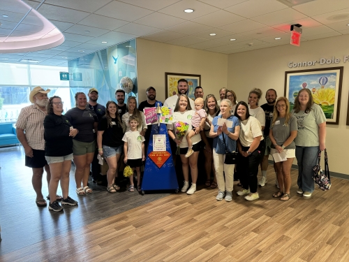 Blakely and her family after her bell-ringing ceremony celebrating no more chemo!