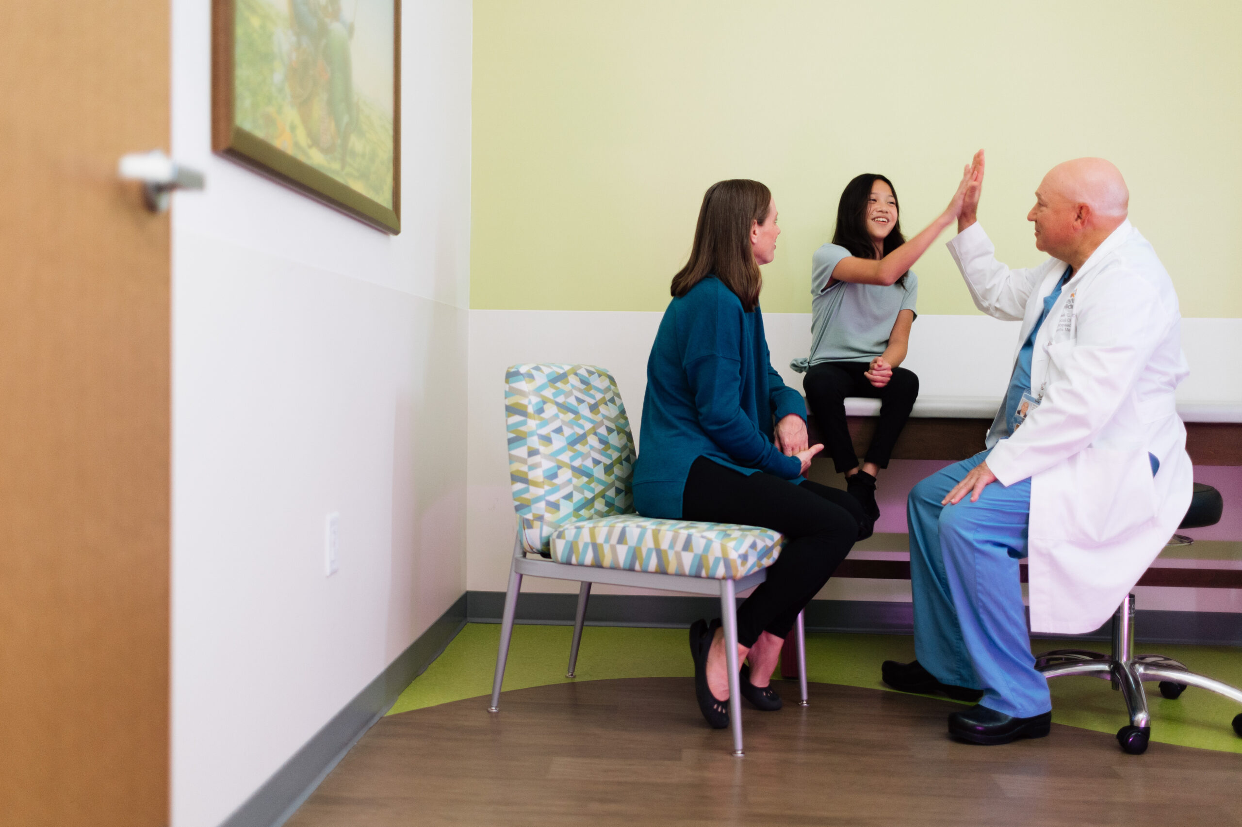 Family meeting with a doctor during a hospital visit at Dayton Children’s Hospital.