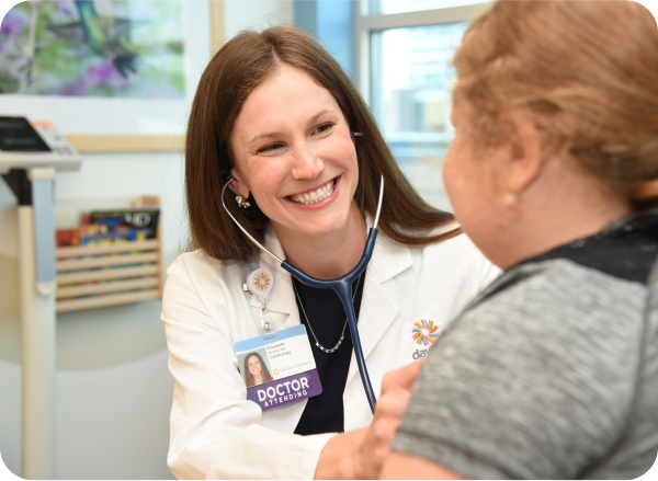 Diverse group of medical professionals standing together, smiling