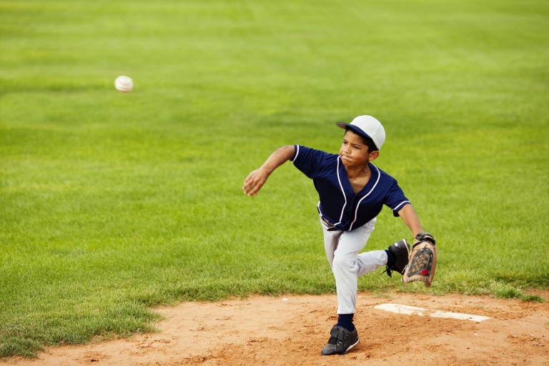 Kid playing sports with a possible overuse injury