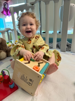 Paisley smiles while at the hospital