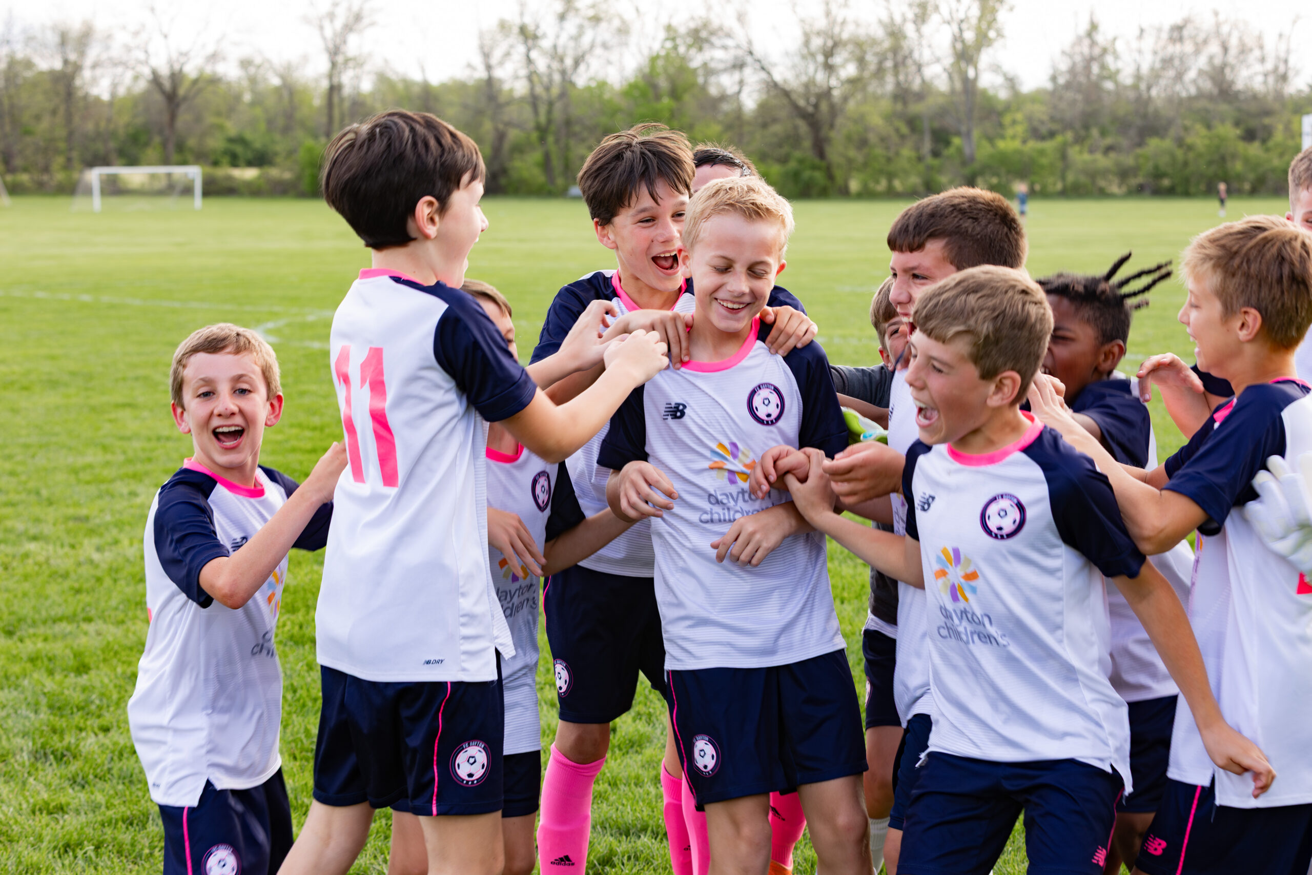 kids celebrate on soccer team
