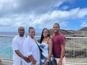 family poses together on vacation