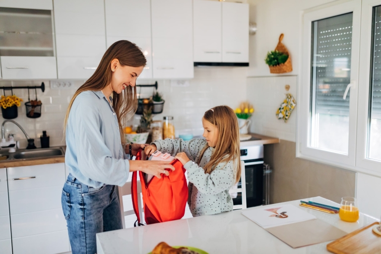 mother and daughter prepare for the school day