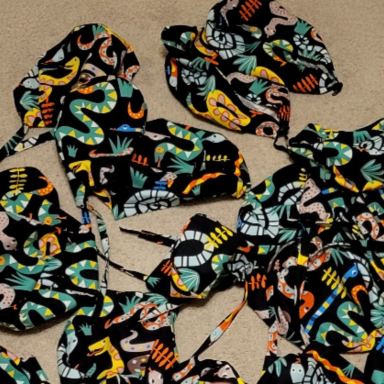 scrub caps with snakes on them