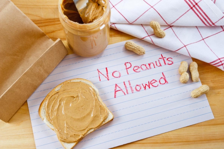 peanut products with a sign that says "no peanuts allowed"