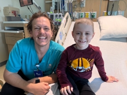 Eric and a care provider at Dayton Children's