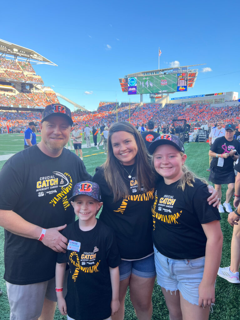 Eric's family attends the Bengals football game