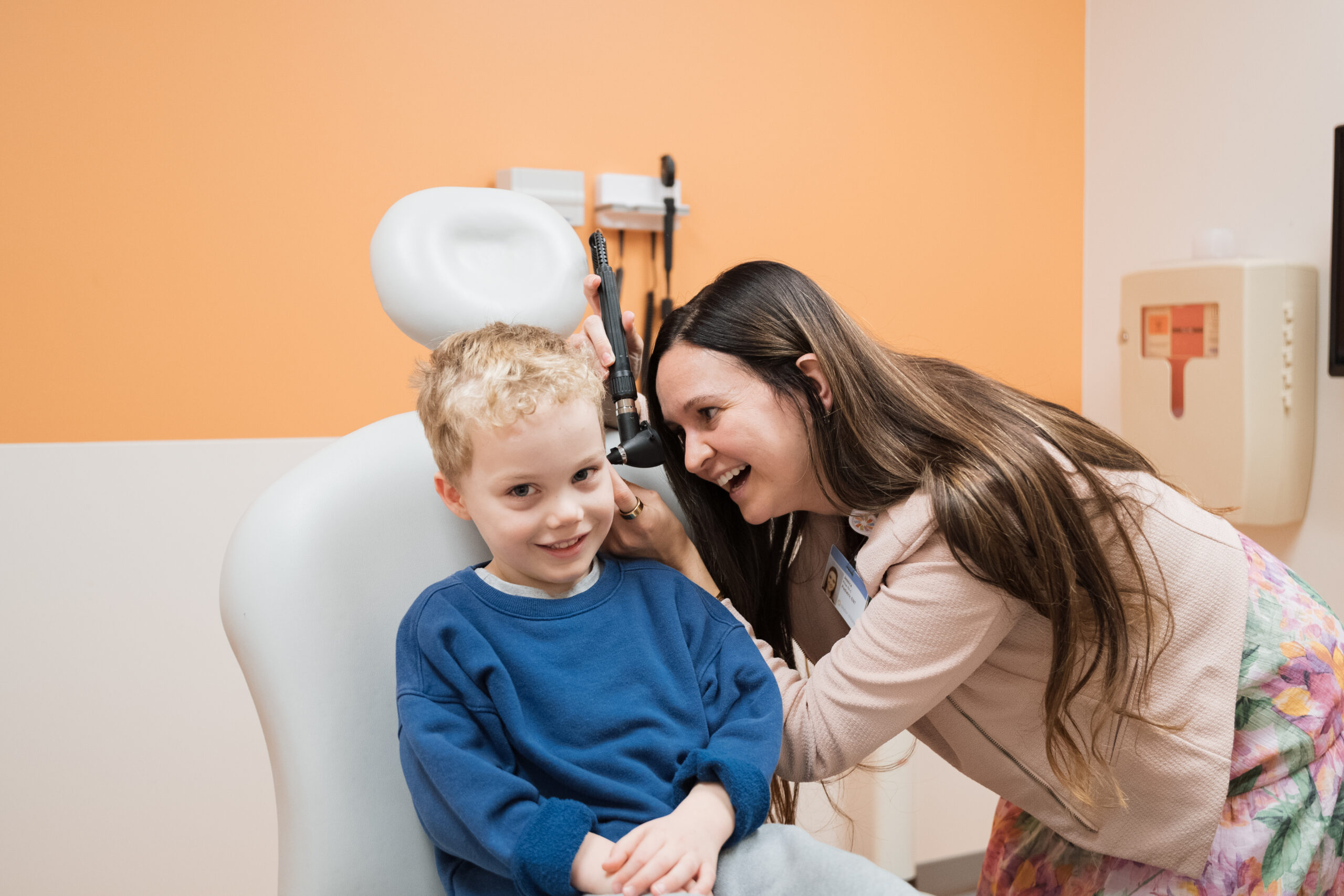 Dr. Price examines a patient's ear at Dayton Children's