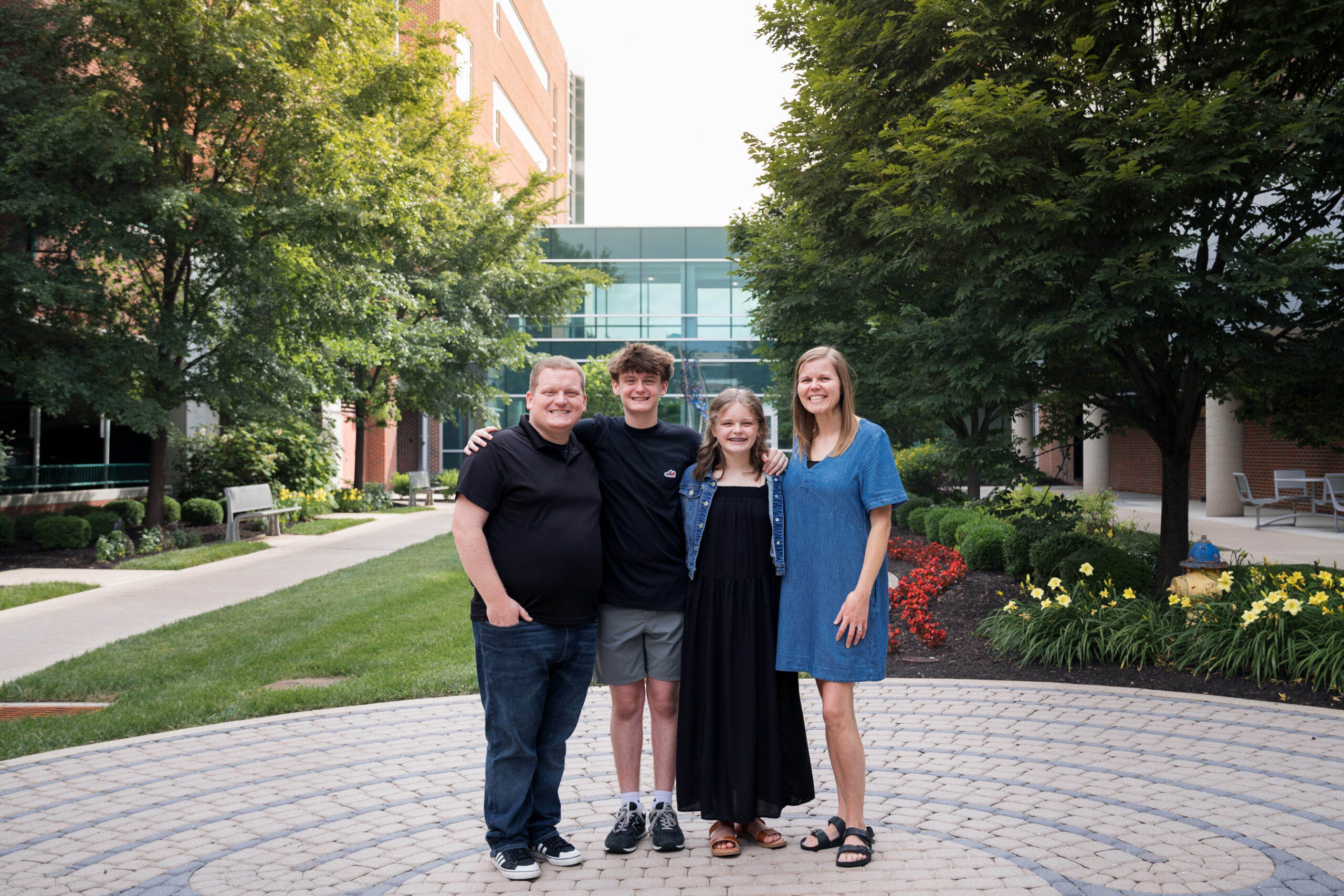 Nehemiah and his family pose for the camera at Dayton Children's