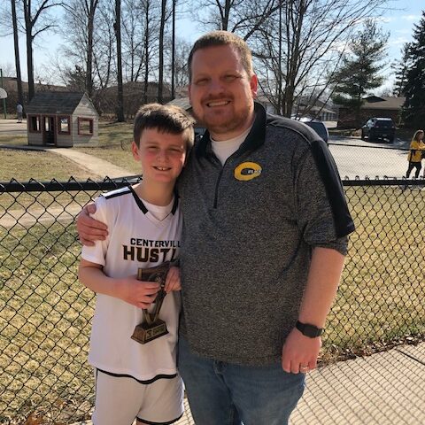 Nehemiah and his dad after a basketball game