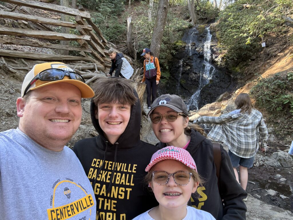 Nehemiah and his family on a hike