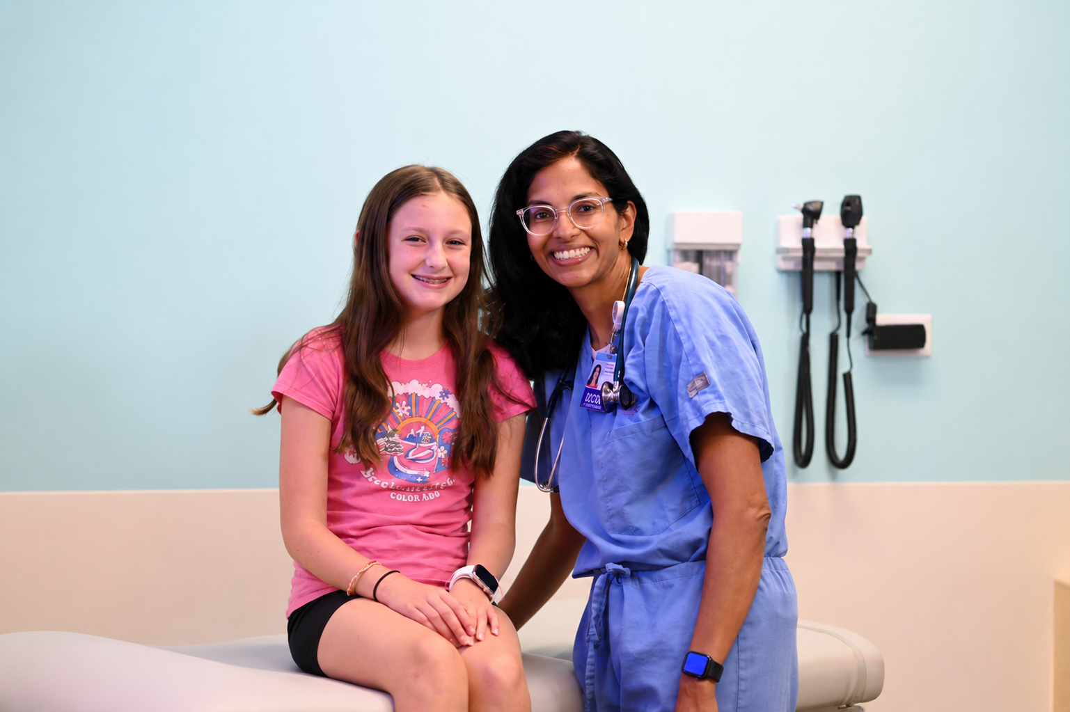 a gastroenterology provider at Dayton Children's poses with a patient
