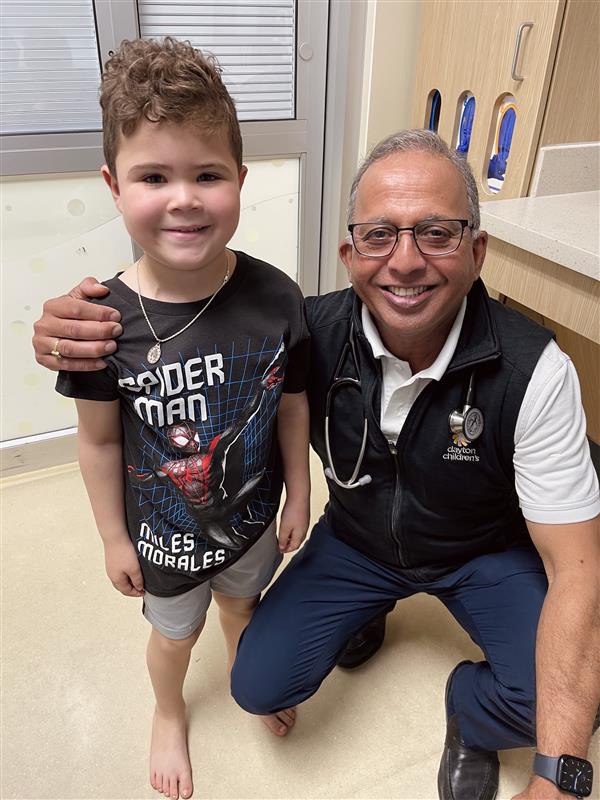 Tripp poses for a photo with Dr. Dole