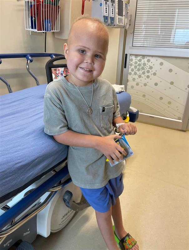 Tripp smiles in his hospital room at Dayton Children's