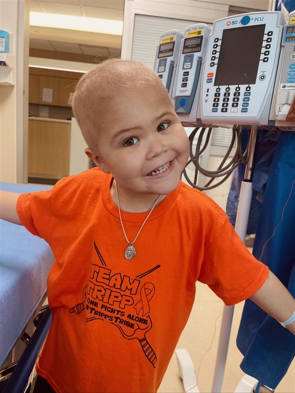 Tripp smiles during treatment